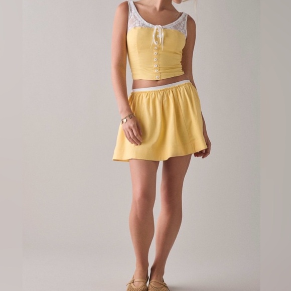 🟤NWT KIMCHI BLUE Veronica Corset Top + Mini
Skirt Set in Yellow/White - Picture 5 of 5